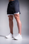 Active treenishortsit tummanharmaa